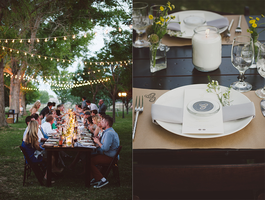 Extra-long wooden wedding dinner table.  Covered in strung lights and candles