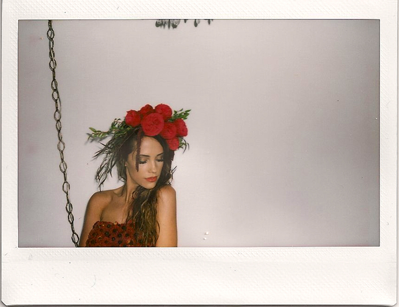 Large floral crown on a bride captured on Polaroid film.