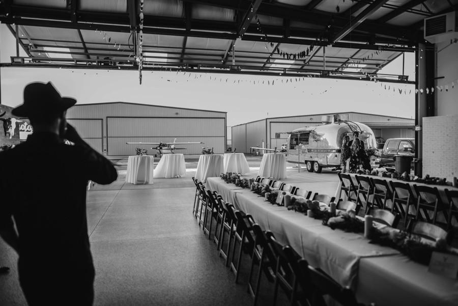 alternative modern industrial outdoor airplane hangar wedding_0099