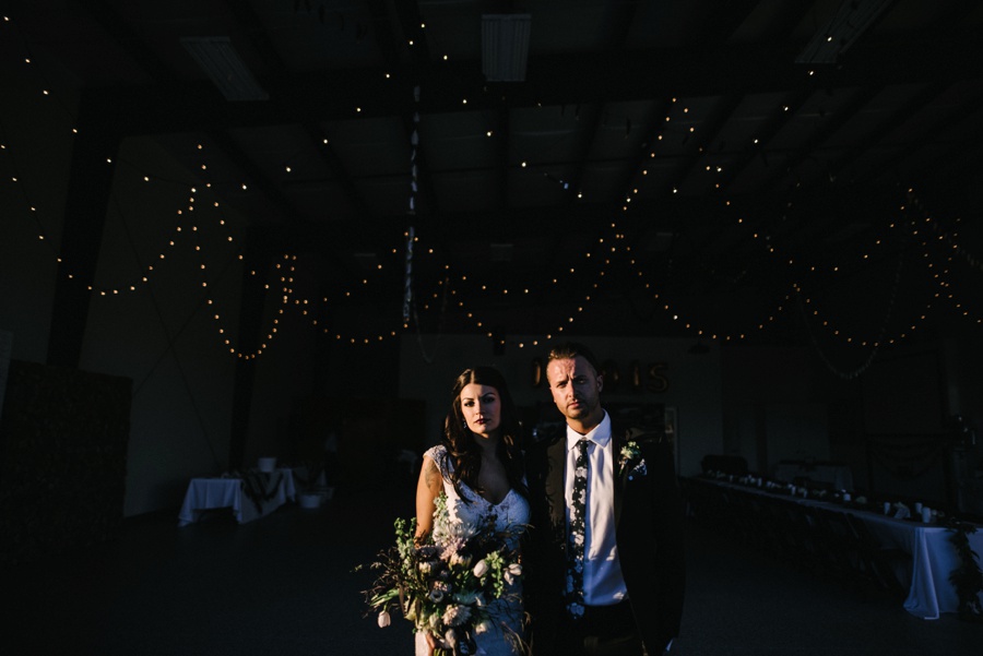 alternative modern industrial outdoor airplane hangar wedding_0110