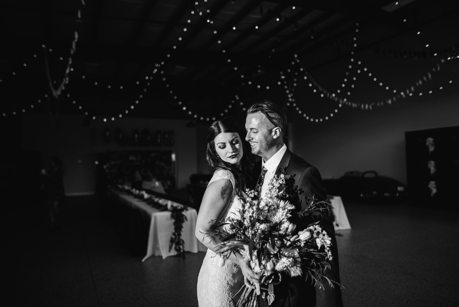 alternative modern industrial outdoor airplane hangar wedding_0113