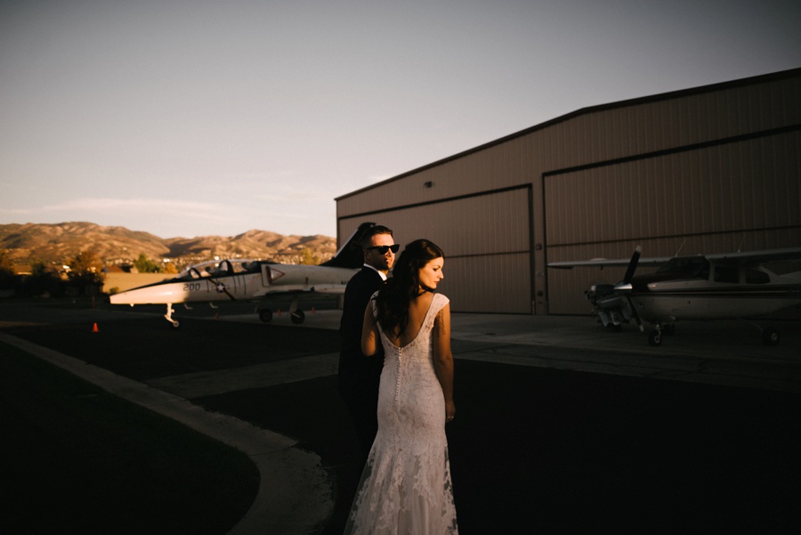 alternative modern industrial outdoor airplane hangar wedding_0115