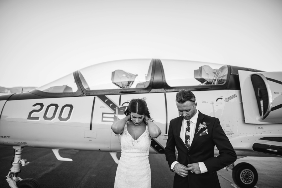 alternative modern industrial outdoor airplane hangar wedding_0118