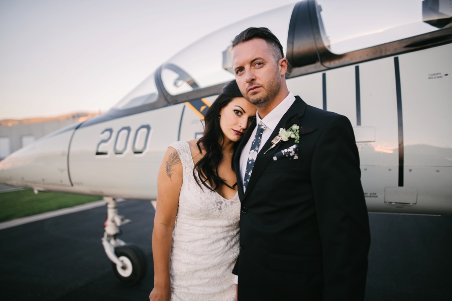 alternative modern industrial outdoor airplane hangar wedding_0121