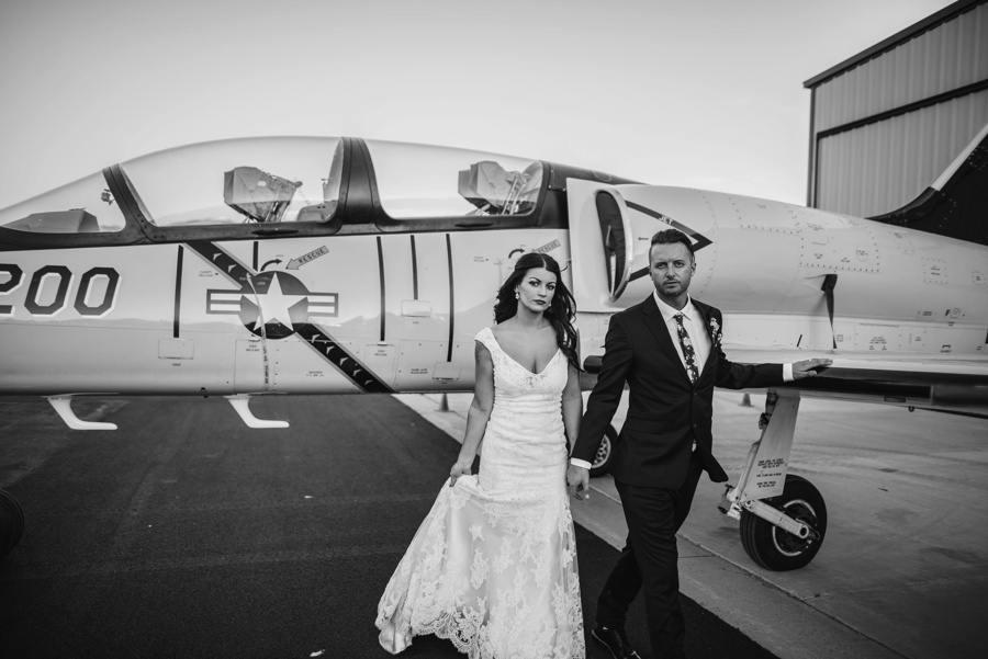 alternative modern industrial outdoor airplane hangar wedding_0122