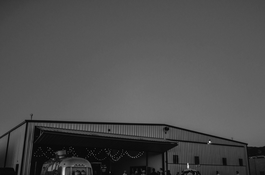 alternative modern industrial outdoor airplane hangar wedding_0133