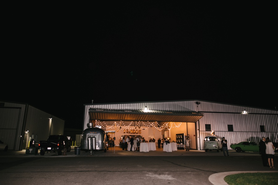 alternative modern industrial outdoor airplane hangar wedding_0160