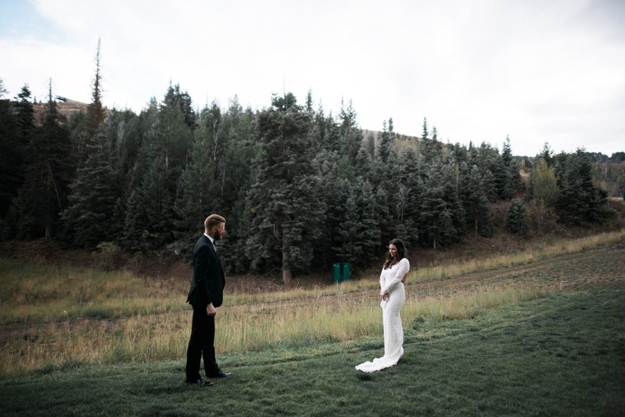 Bride and Groom first look photo in the Utah mountains