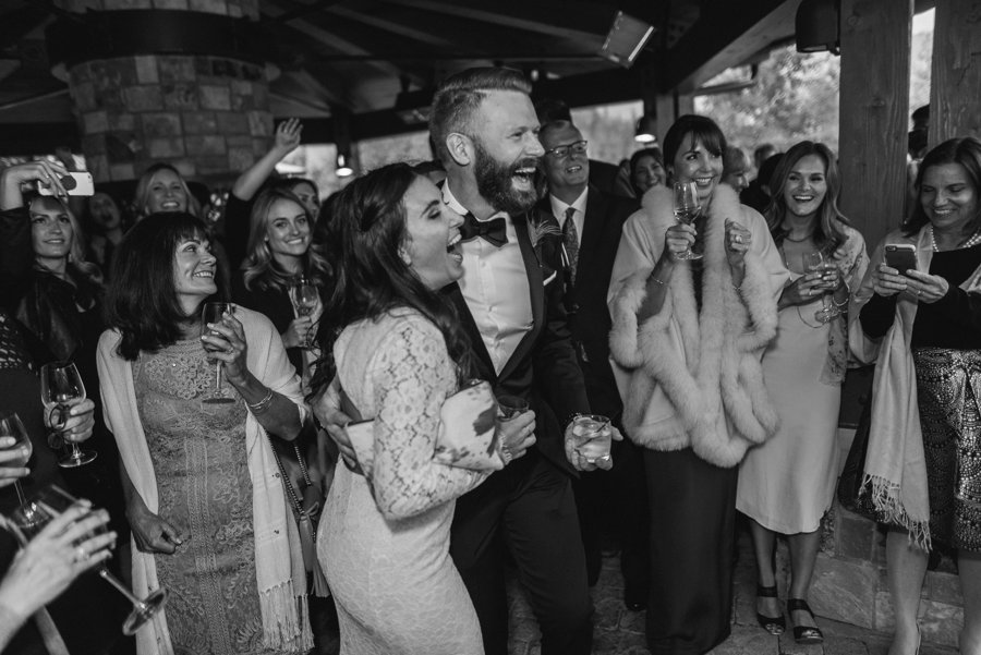 Bride and groom celebrating at the St Regis Deer Valley