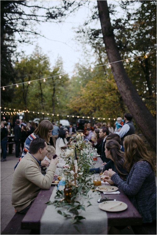 Long wooden dinner table at Millcreek Canyon wedding in Utah